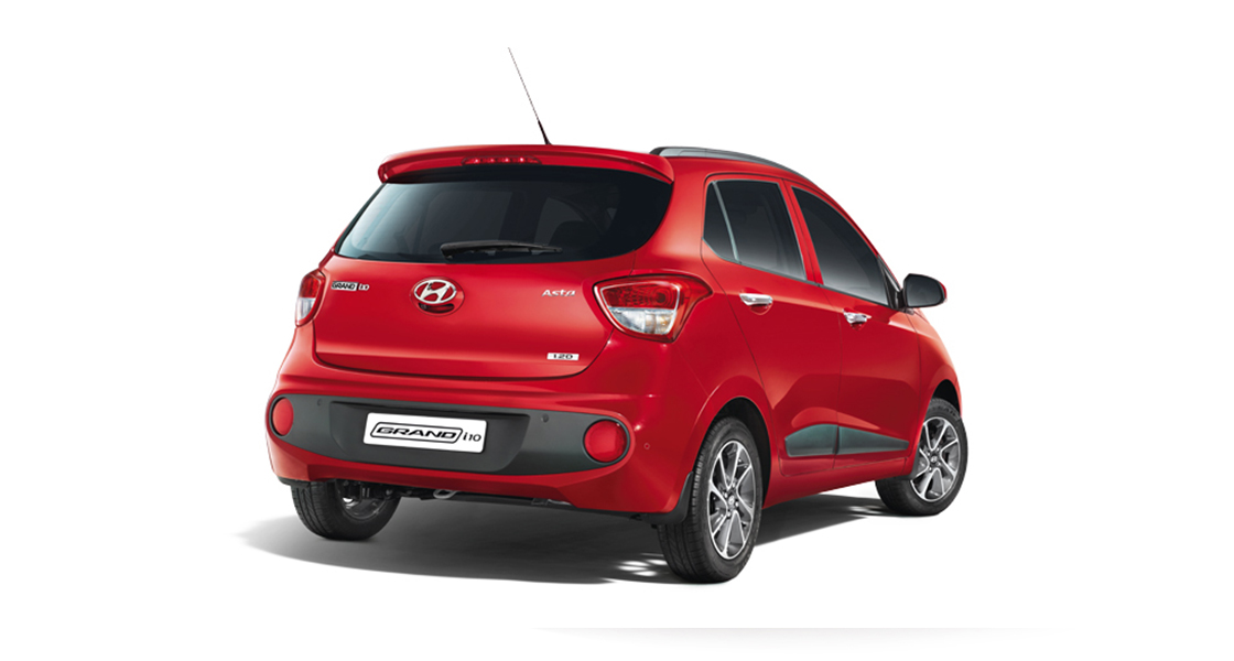Left side front view of orange Grandi10