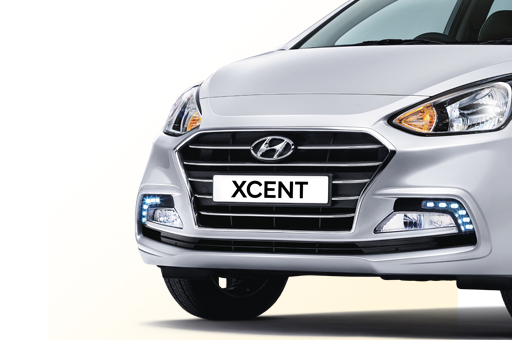 Radiator grille with Xcent logo