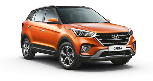 Right side rear view of driving silver creta on the road