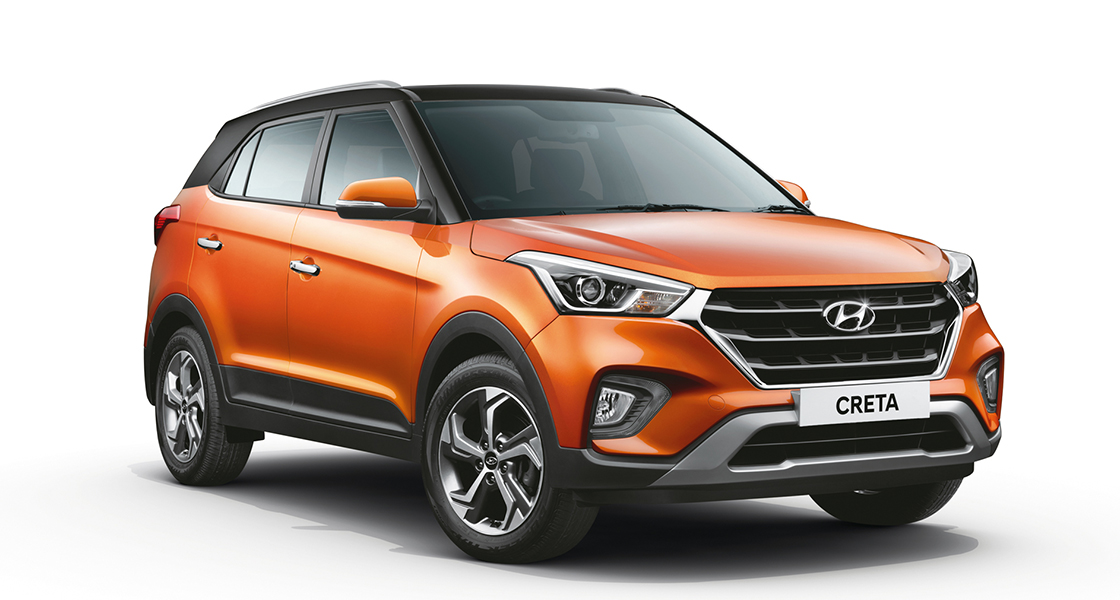 Right side rear view of driving silver creta on the road