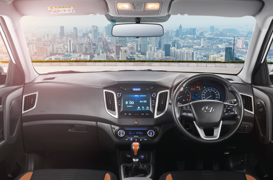 Cockpit area with steering wheel